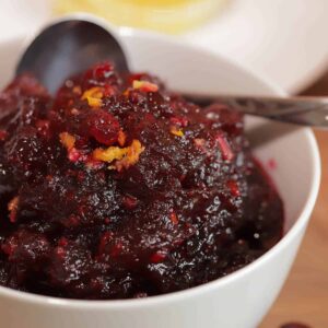 Cranberry sauce in a white bowl.