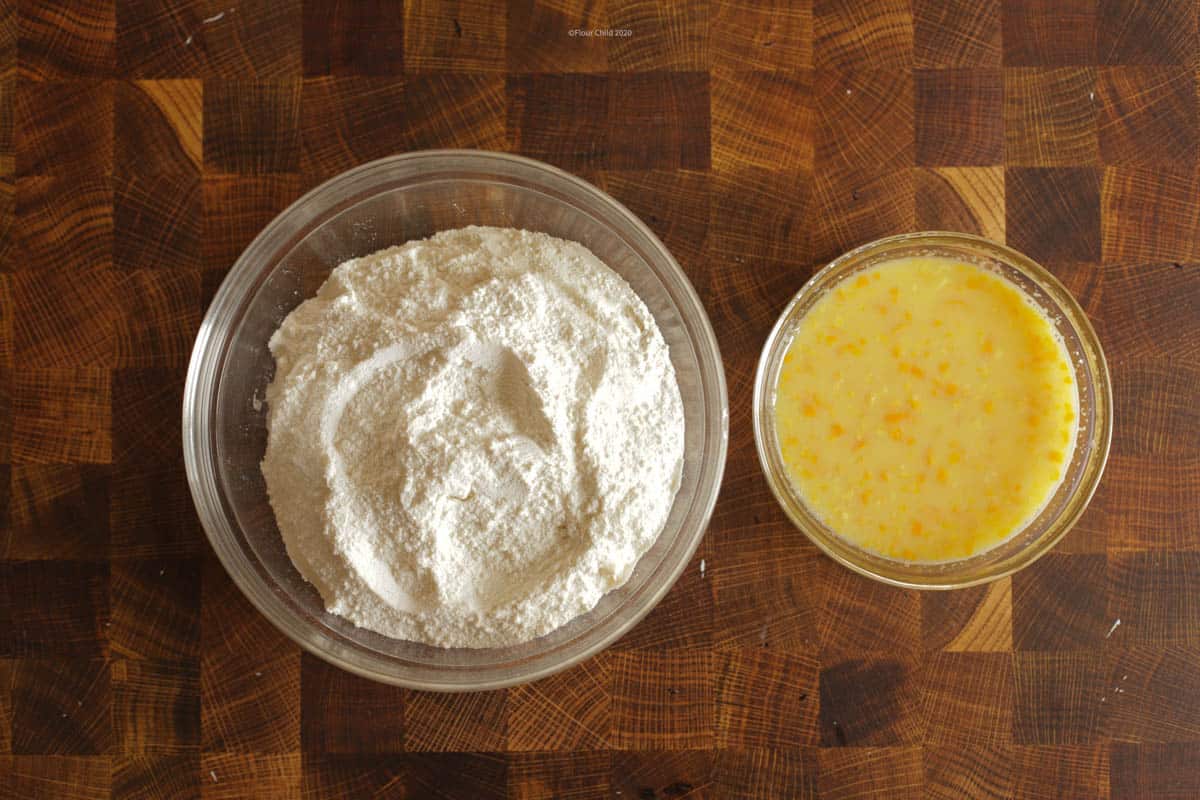 Batter mixture and juice mixture  in side-by-side bowls