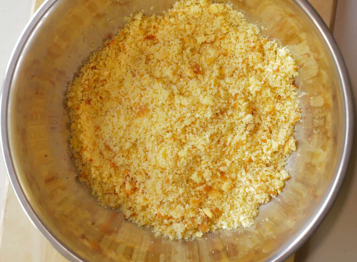 cornbread broken up into crumbs in bowl
