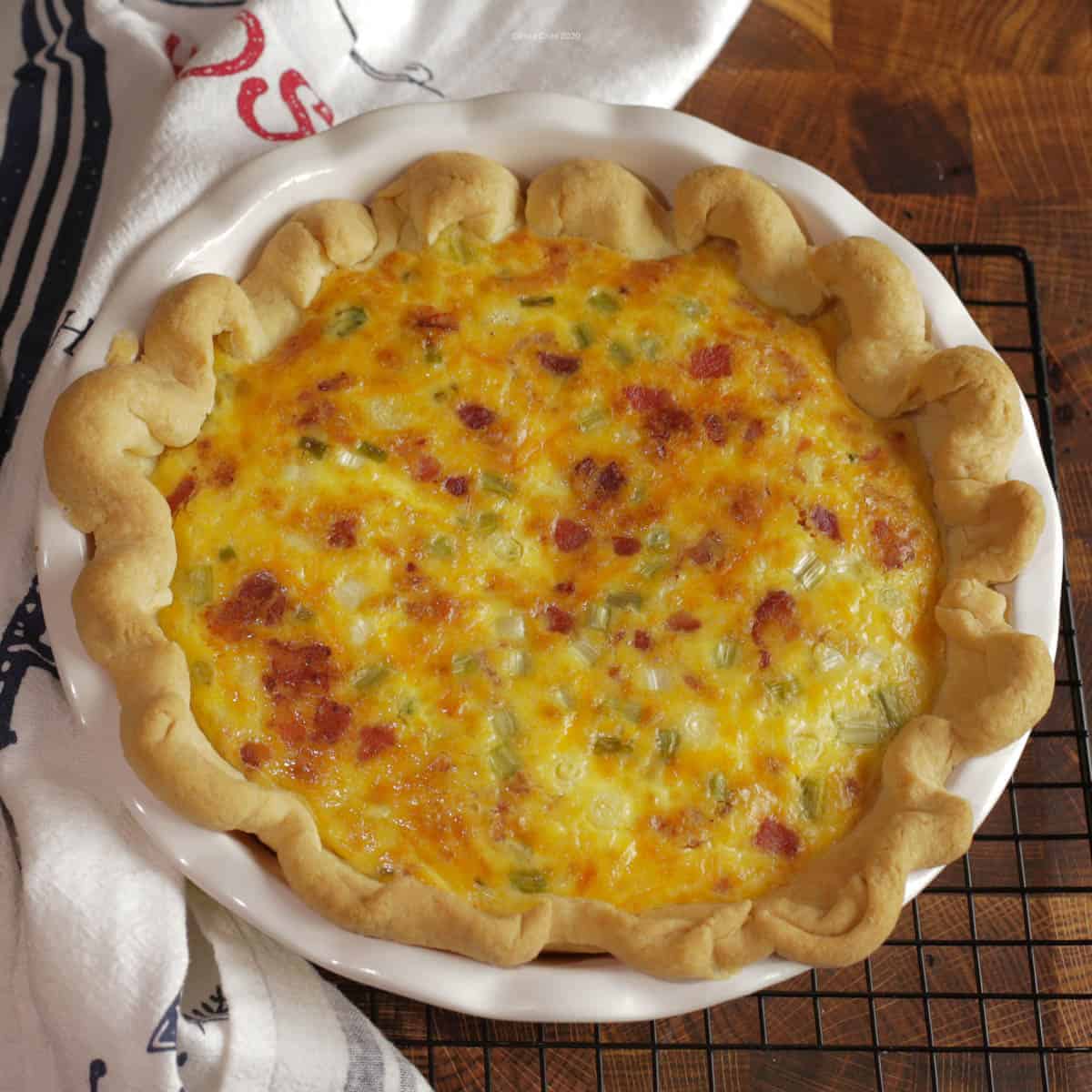 Bacon asparagus quiche in a pie plate