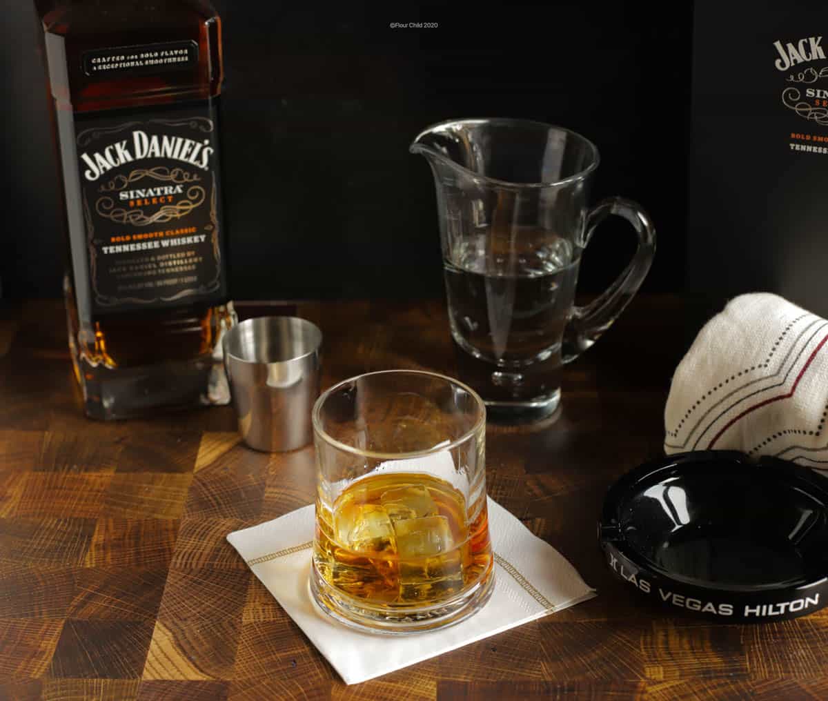 A rocks glass with Jack Daniels Sinatra Select whiskey. 