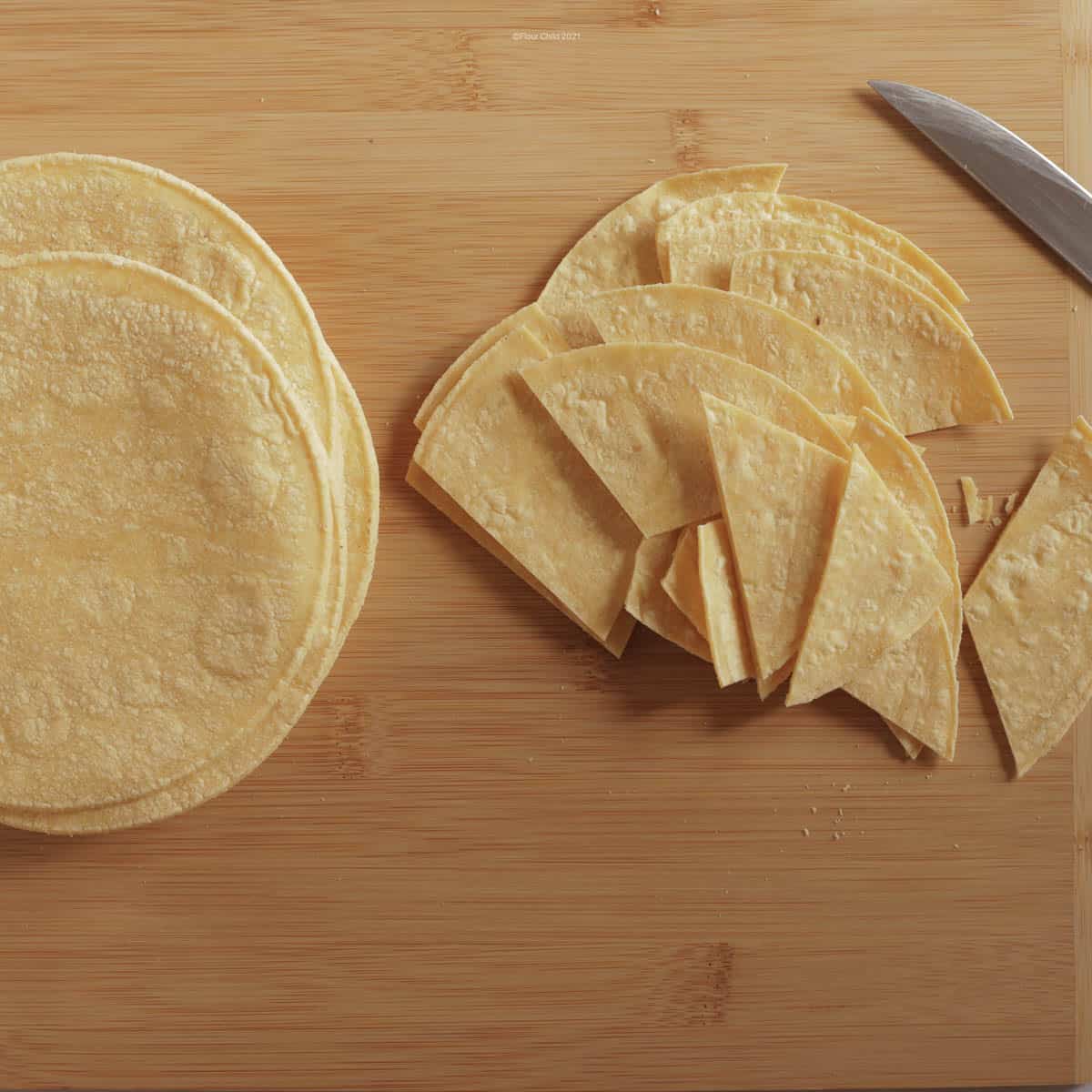 Corn tortillas cut into chip size