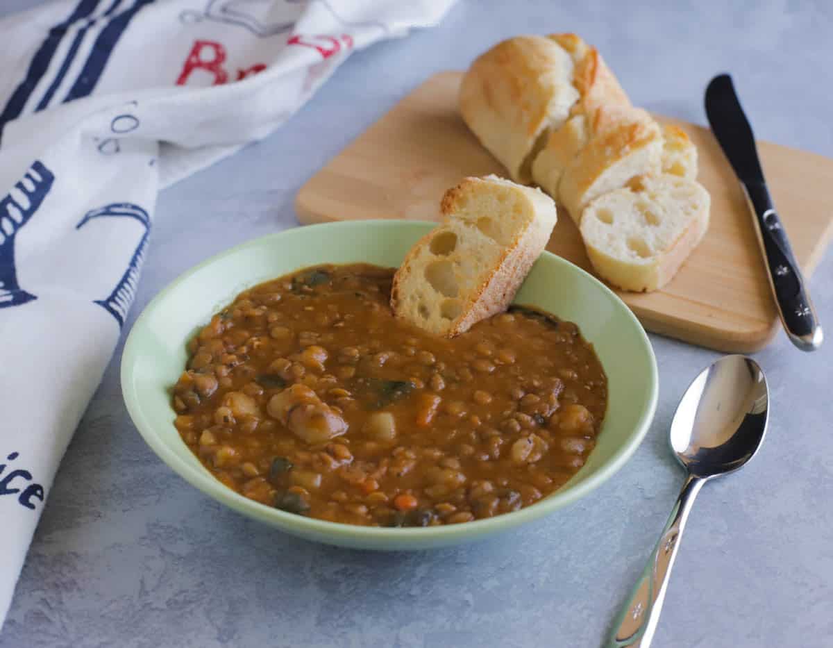 Bowl of Lentil soup with sliced bread