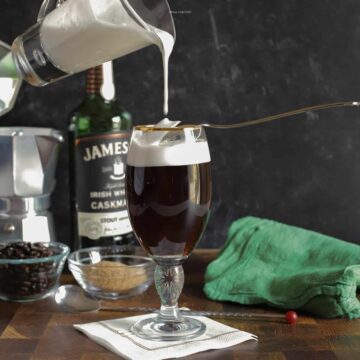 A hot coffee glass with Irish Whisky and cream.