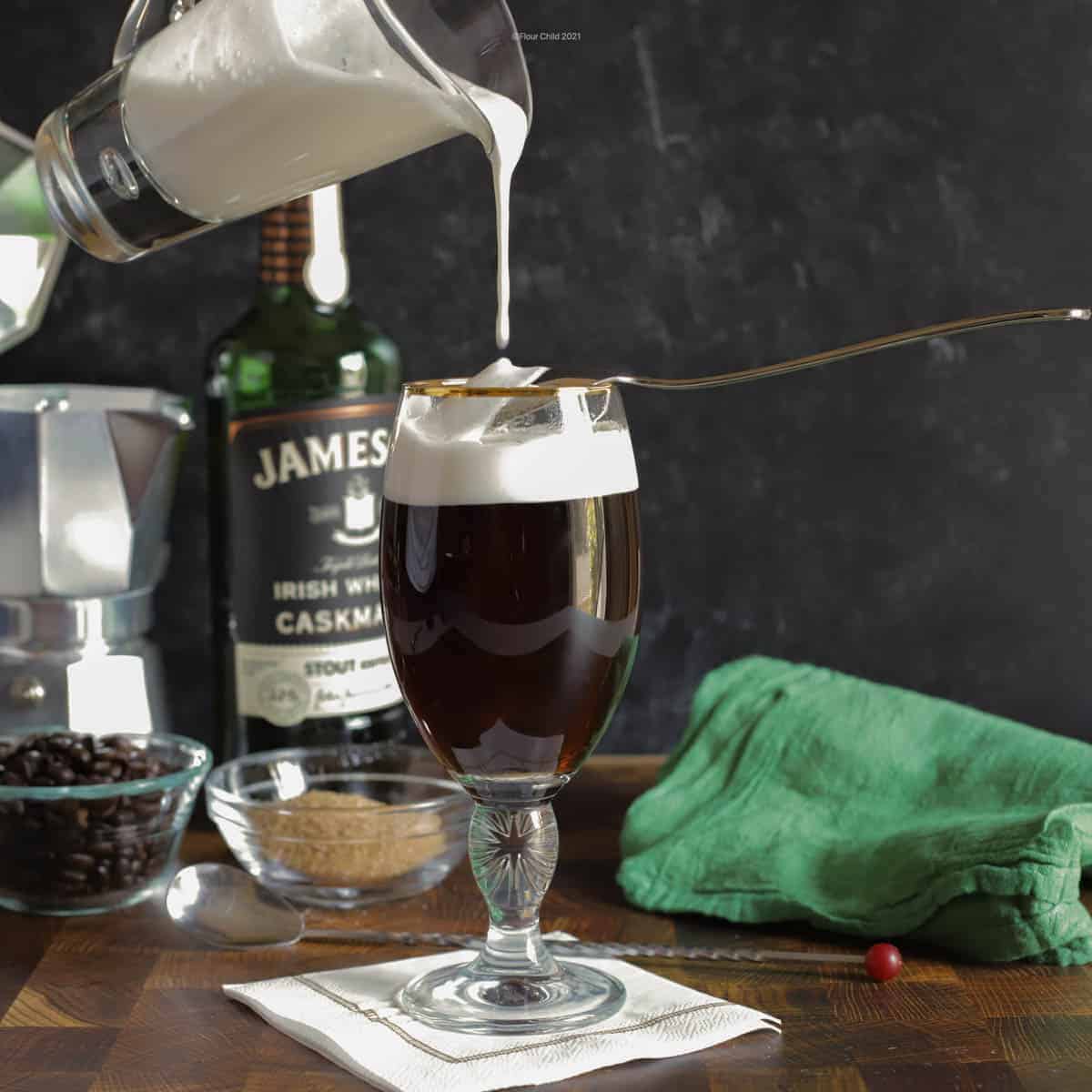 A hot coffee glass with Irish Whisky and cream