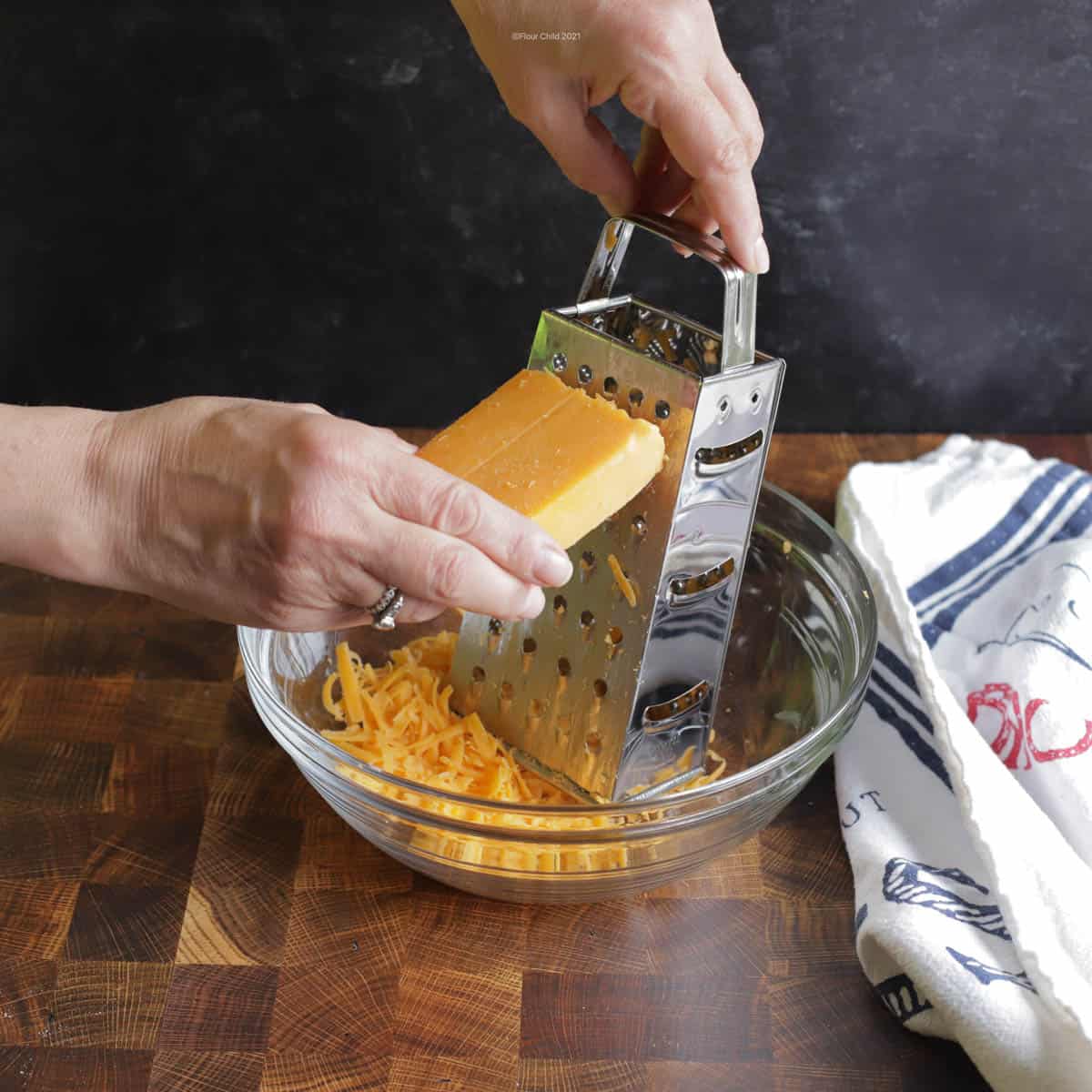 Grating cheese with a box grater