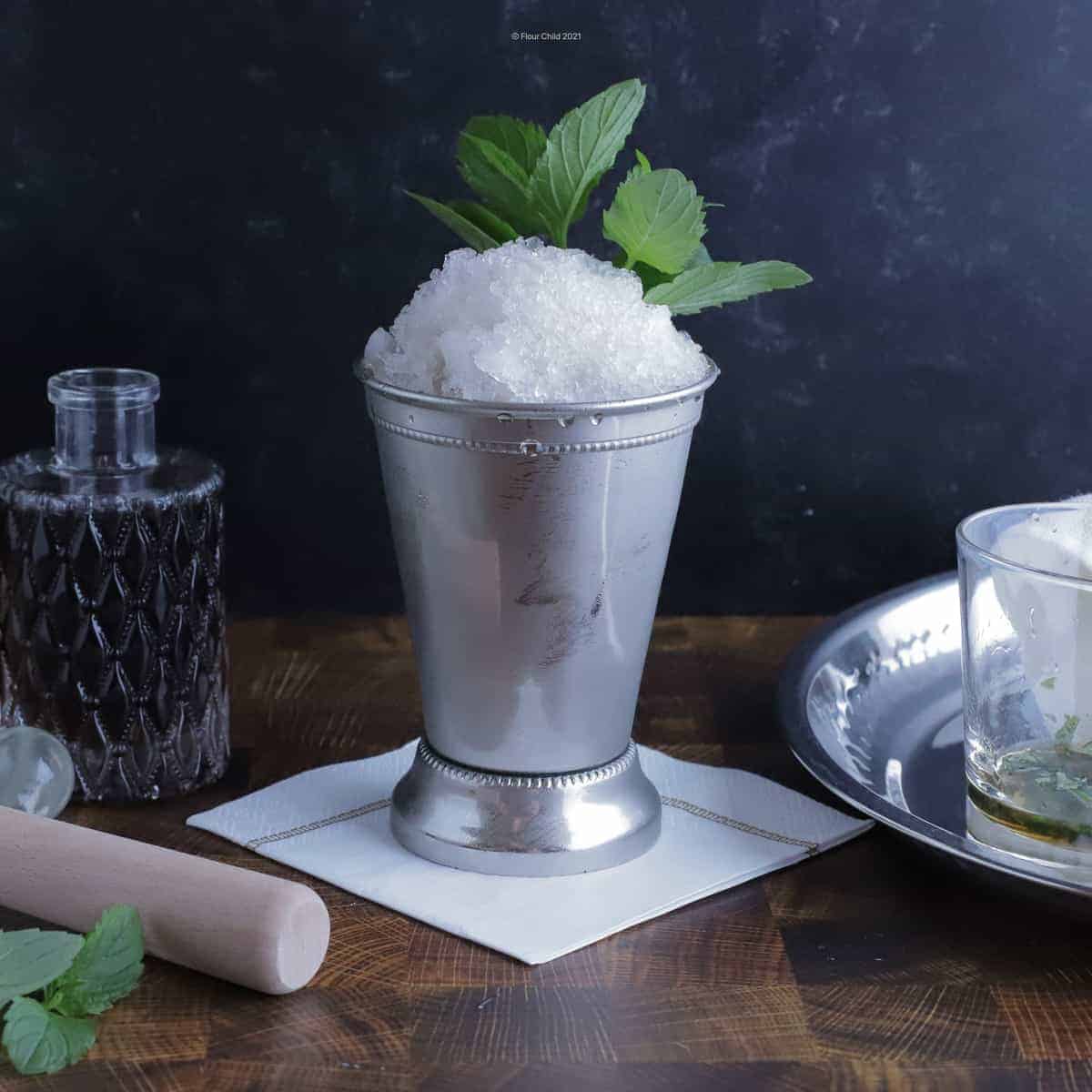 mint julep in a silver cup.