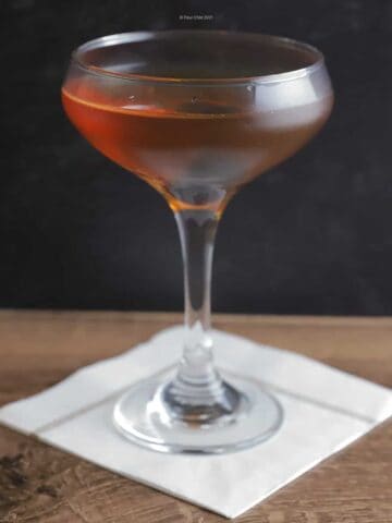 The simple, elegant Manhattan cocktail with Bourbon in a cocktail glass