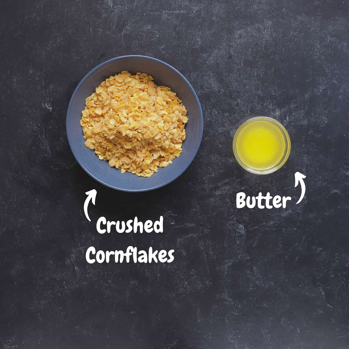 Two ingredients for cheesy potato casserole topping laid out on board