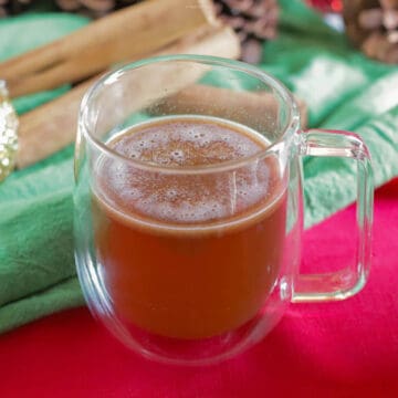 Clear mug of hot buttered bourbon