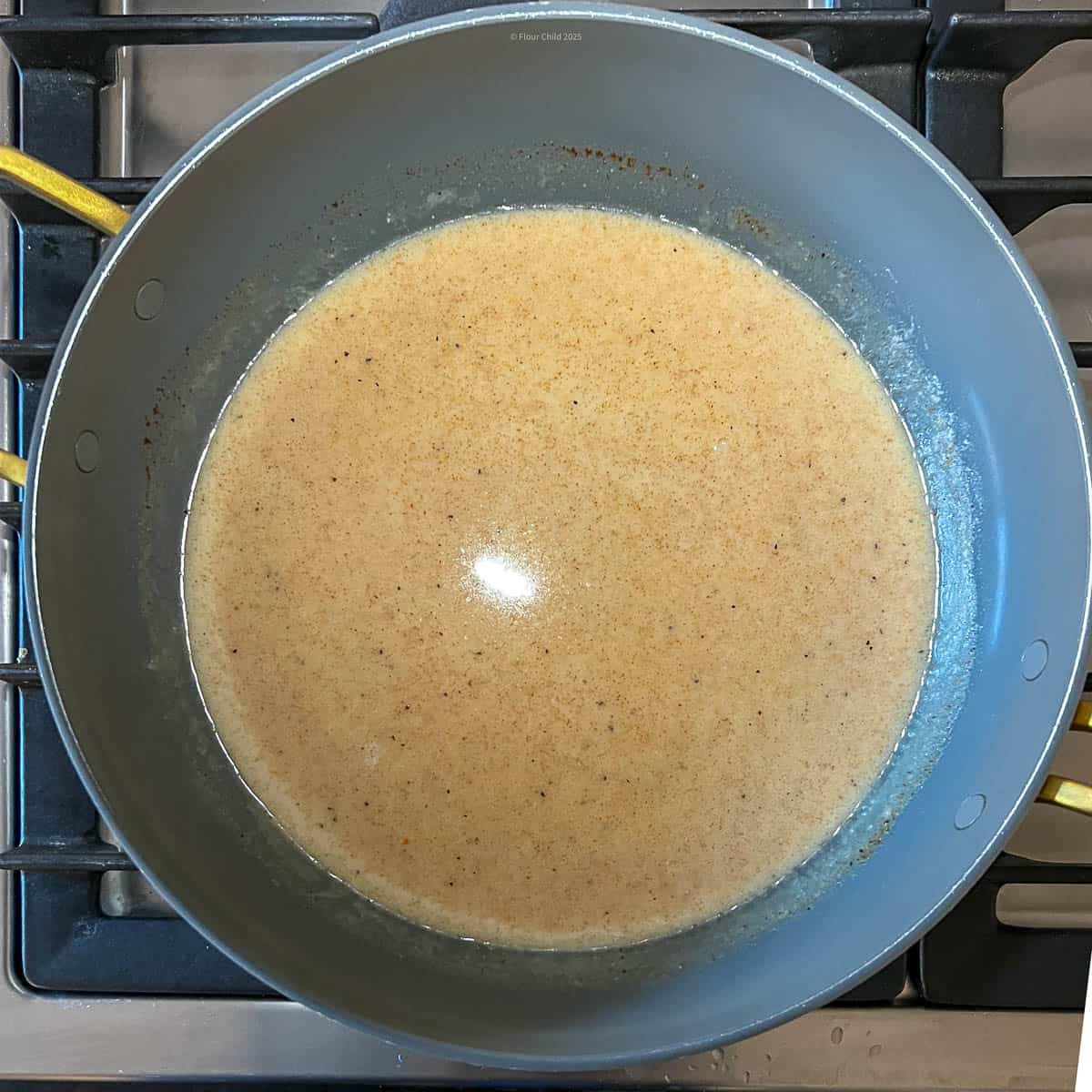 Flour mixture with chicken broth, milk, paprika, salt and pepper mixed in.